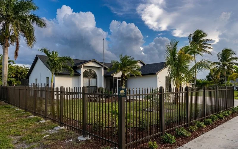 Aluminum ornamental fence with reinforced posts withstanding South Florida tropical storm winds at Miami property